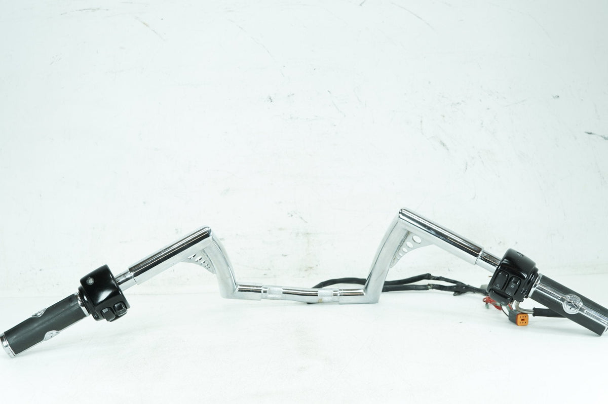 Used Harley-Davidson handlebars with left and right switch controls at Exclusive Harley Parts