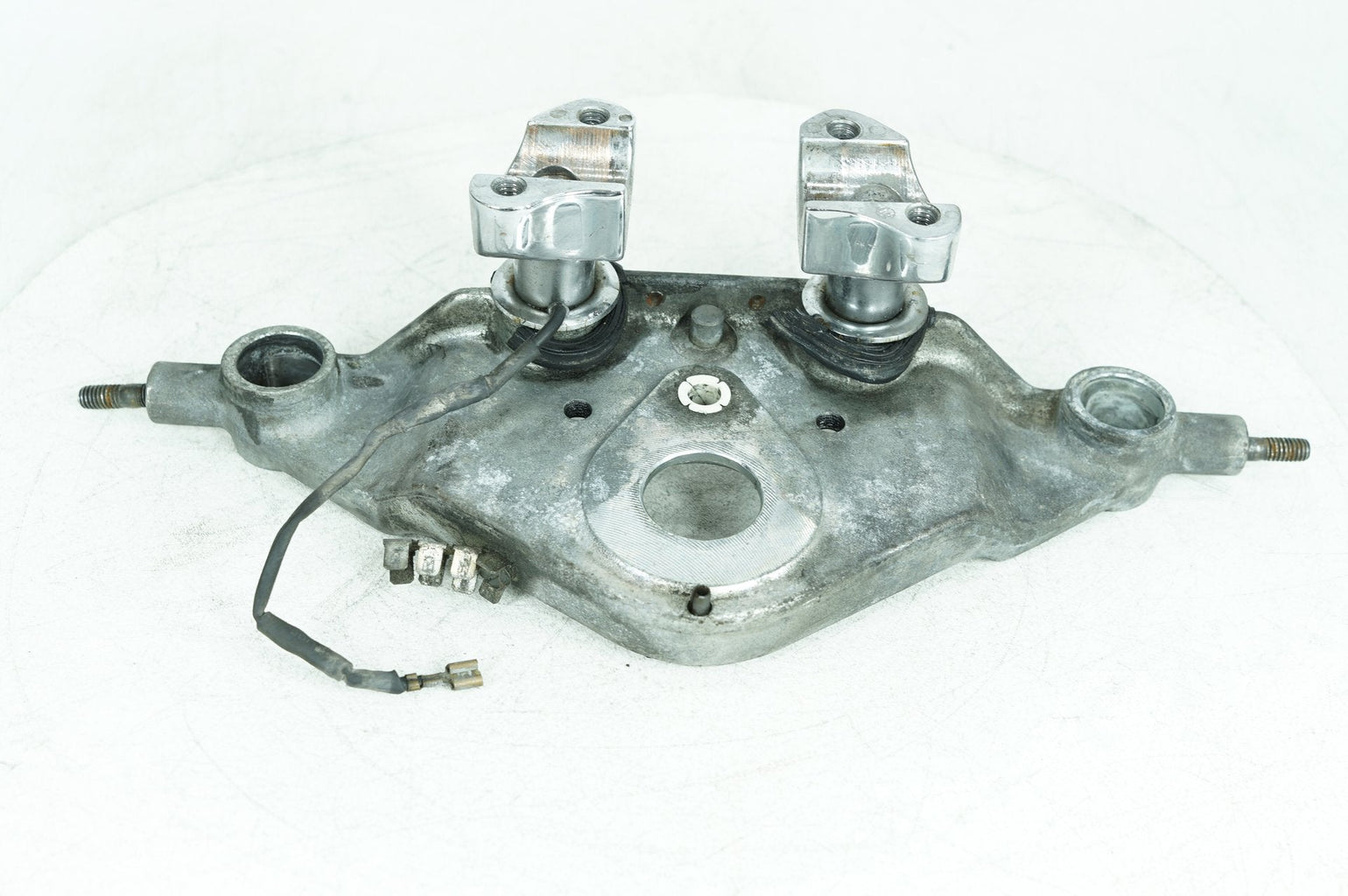 Used Harley-Davidson front fork upper triple tree clamps at Exclusive Harley Parts