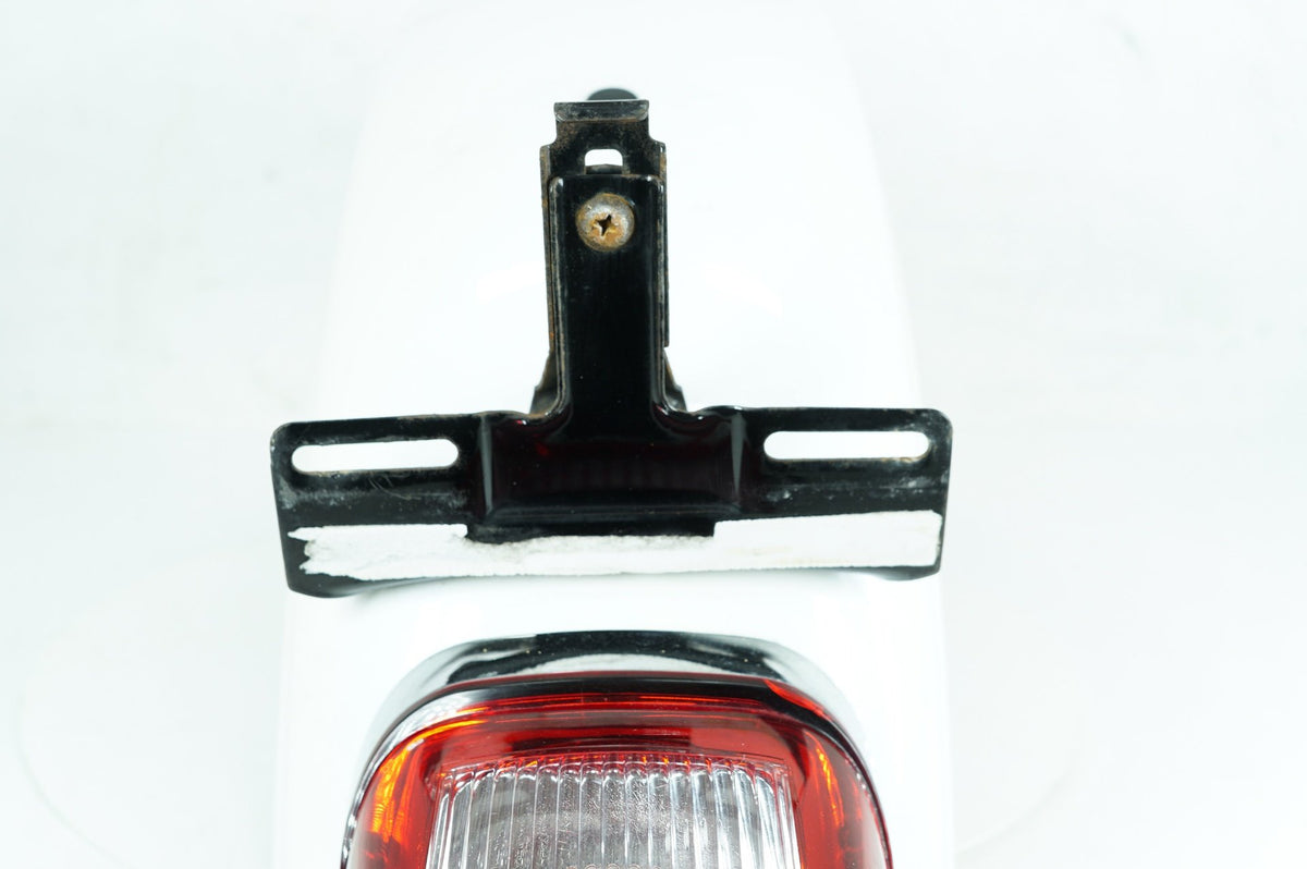 2006 Harley Sportster XL883 L Low OEM Rear Wheel Fender Taillight Brake Lamp