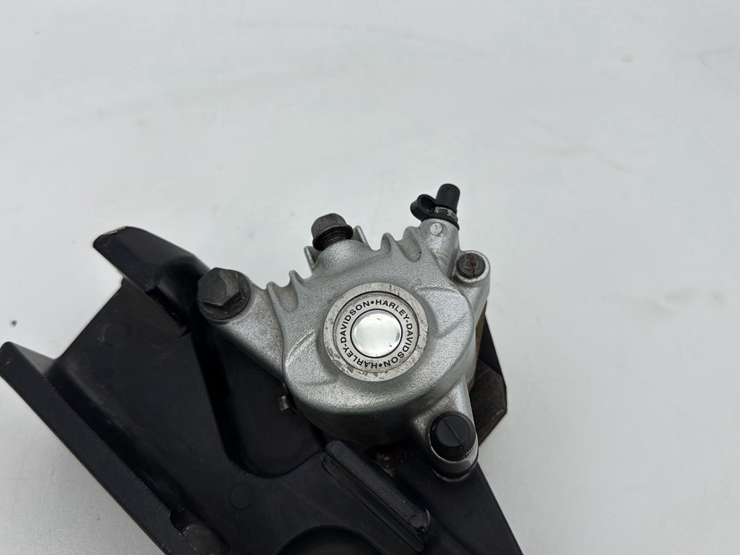 2009 Harley Sportster XL1200C 1200 Custom OEM Rear Back Brake Caliper w/ Bracket
