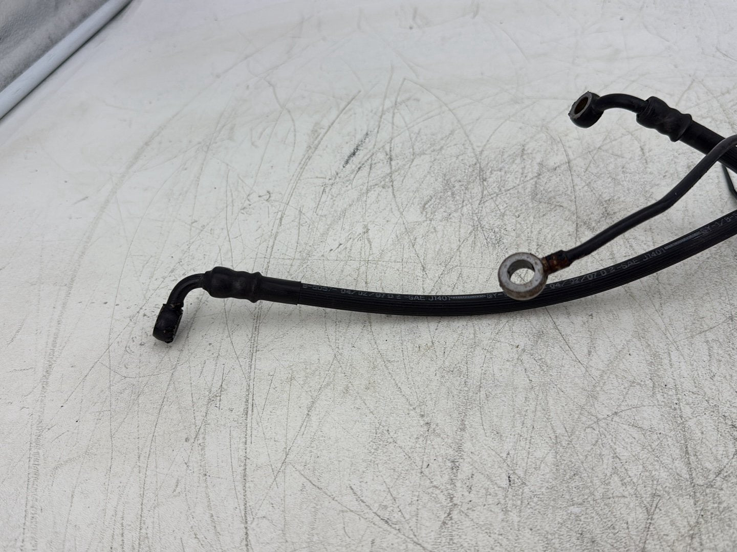 2007 Harley Touring FLHTC Electra Glide Classic OEM Front Brake Hose Line Pipe