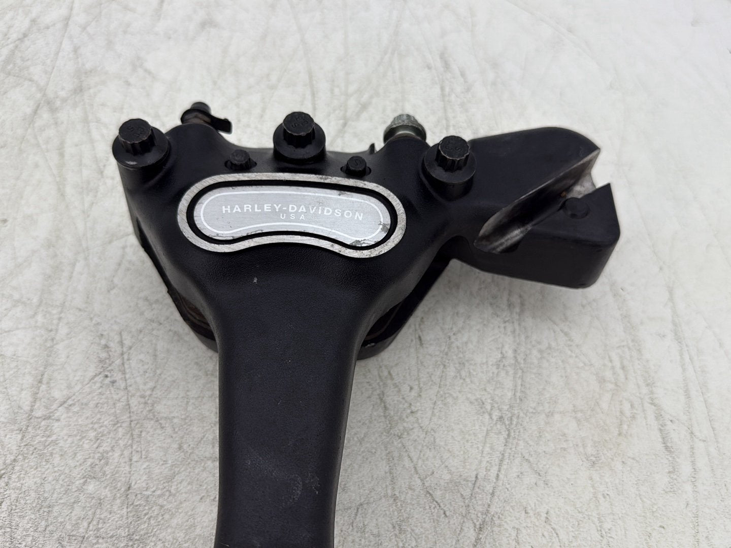 2004 Harley Dyna Super Glide FXDI OEM Rear Brake Caliper Bracket