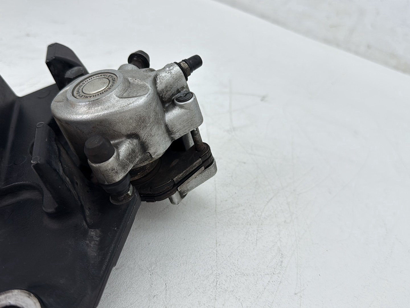 2009 Harley Sportster 883 Low XL883L OEM Rear Back Brake Caliper w/ Bracket