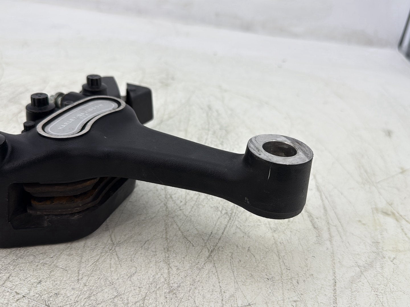 2004 Harley Dyna Super Glide FXDI OEM Rear Brake Caliper Bracket