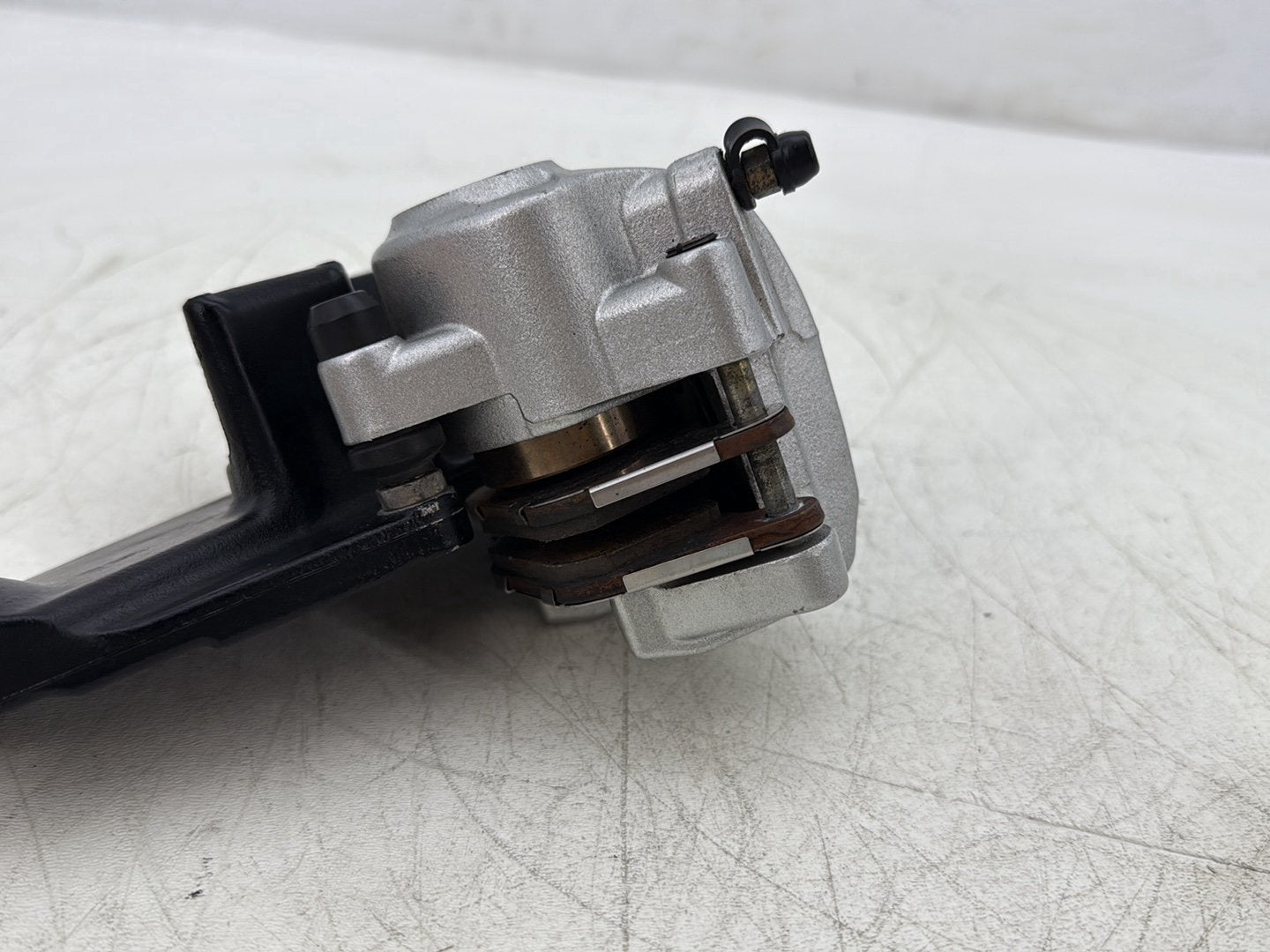 2006 Harley Sportster XL883L 883 Low OEM Rear Back Brake Caliper w/ Bracket