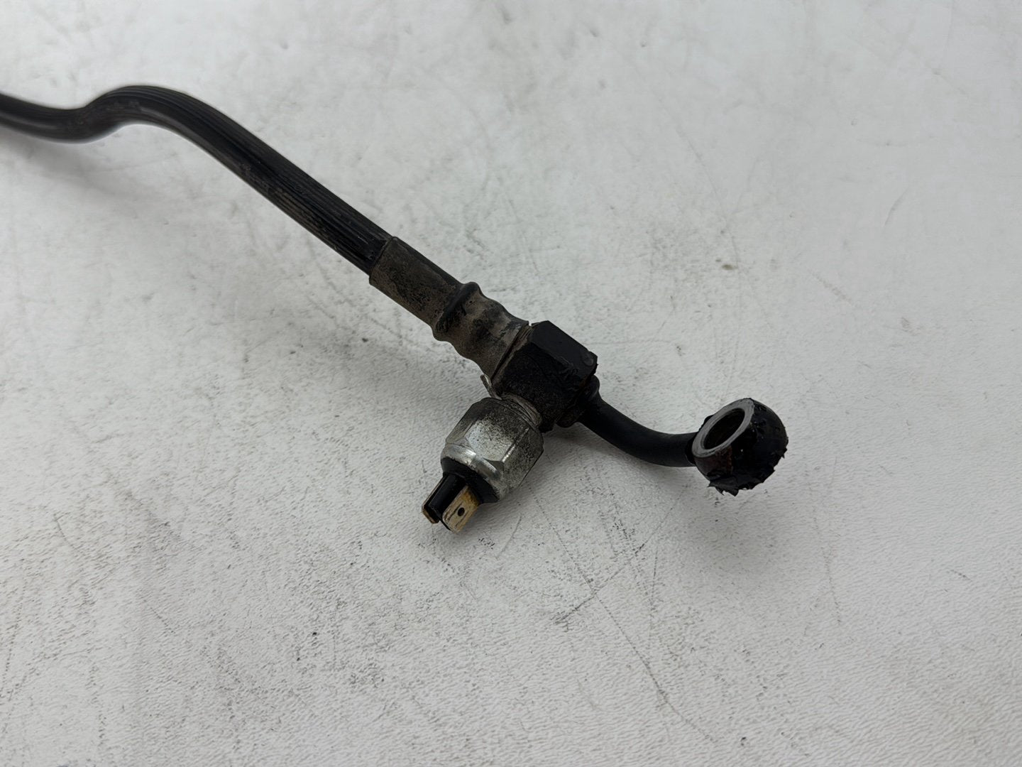 2006 Harley Dyna FXDWGI Wide Glide OEM Rear Brake Hose Line Pipe