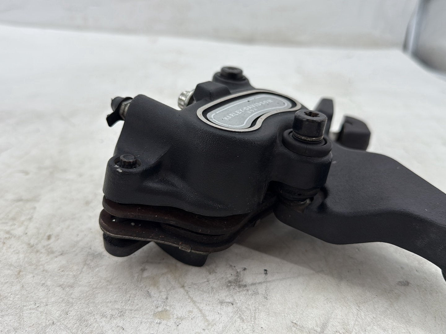 2012 Harley Dyna FXDF Fat Bob OEM Rear Back Brake Caliper w/ Bracket