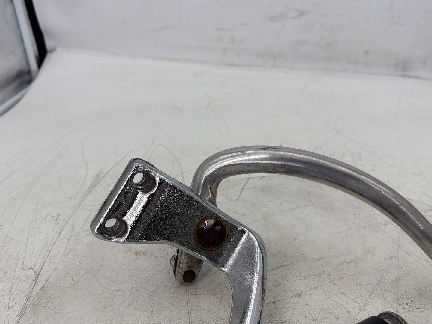2015 Harley Dyna Low Rider FXDL OEM Right Driver Footpeg Bracket Mount