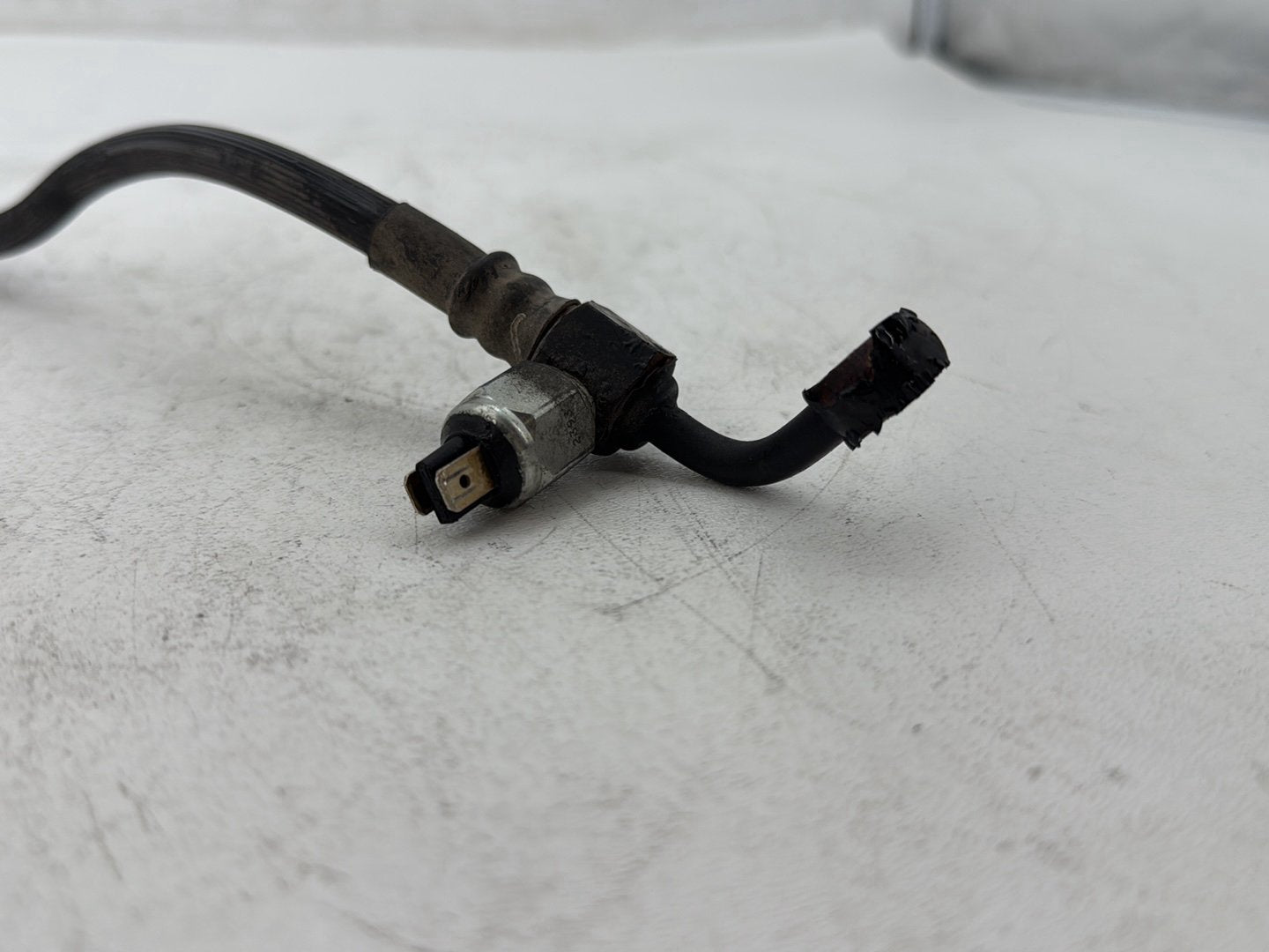 2006 Harley Dyna FXDWGI Wide Glide OEM Rear Brake Hose Line Pipe