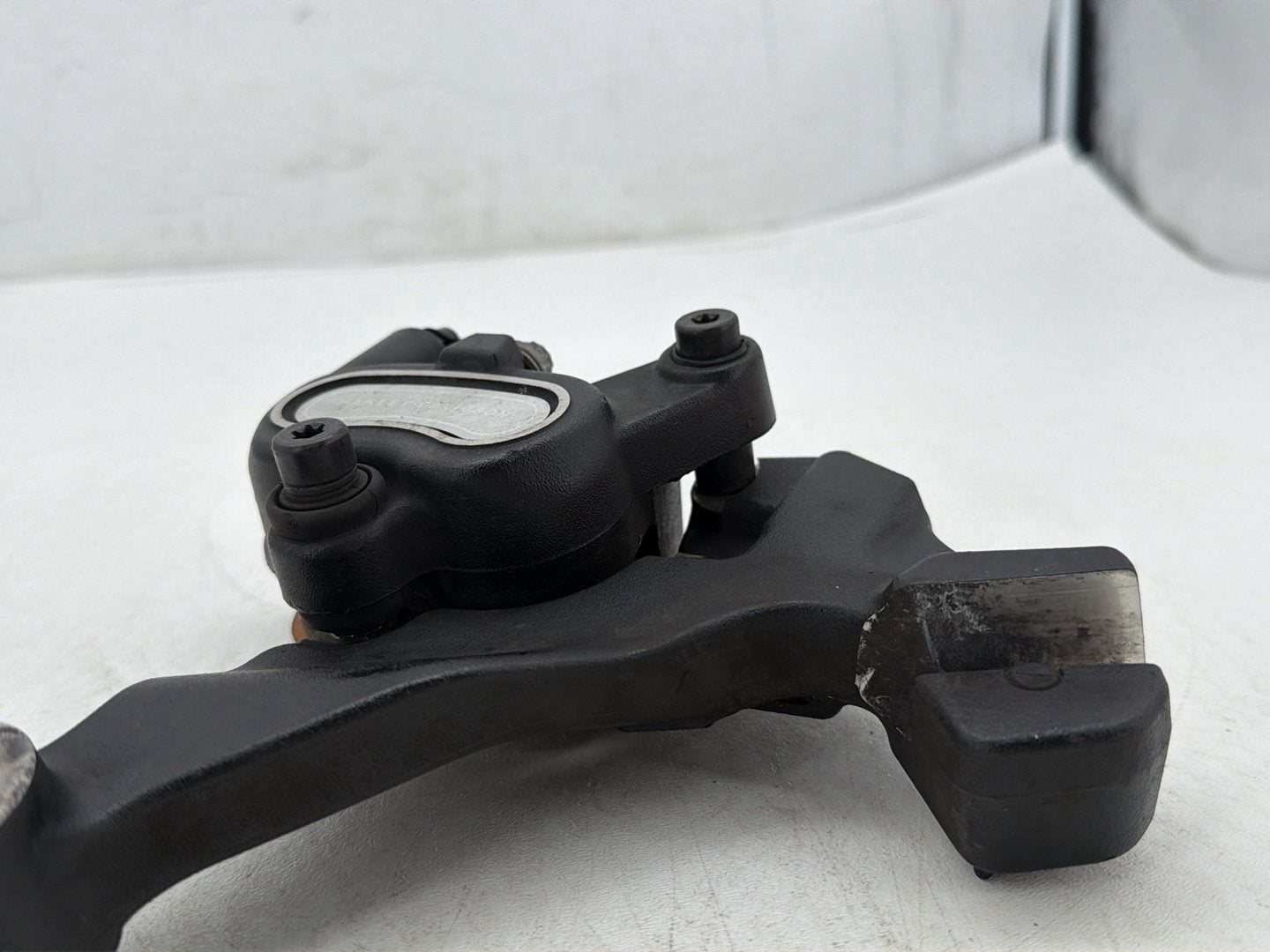2009 Harley Dyna Street Bob FXDB OEM Rear Back Brake Caliper w/ Bracket