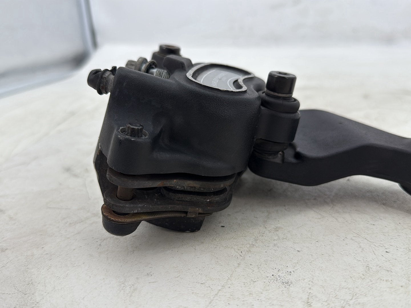 2015 Harley Dyna Low Rider FXDL OEM Rear Back Brake Caliper w/ Bracket