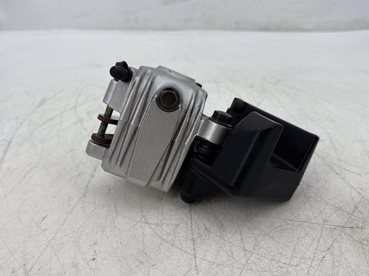 2006 Harley Sportster XL883L 883 Low OEM Rear Back Brake Caliper w/ Bracket