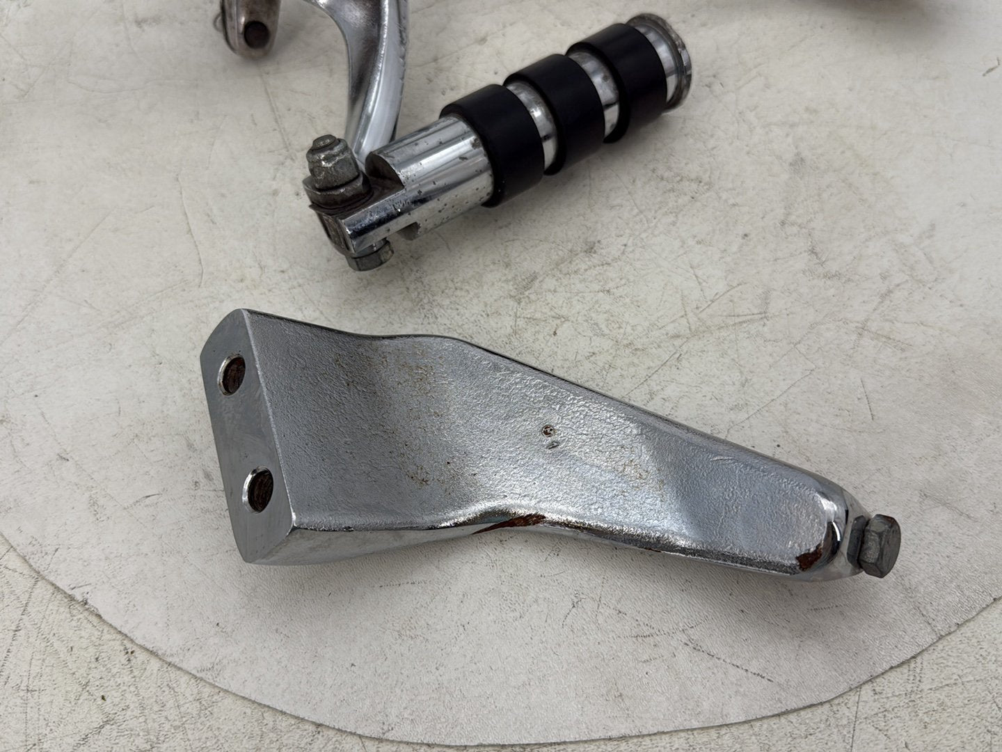 2015 Harley Dyna Low Rider FXDL OEM Right Driver Footpeg Bracket Mount