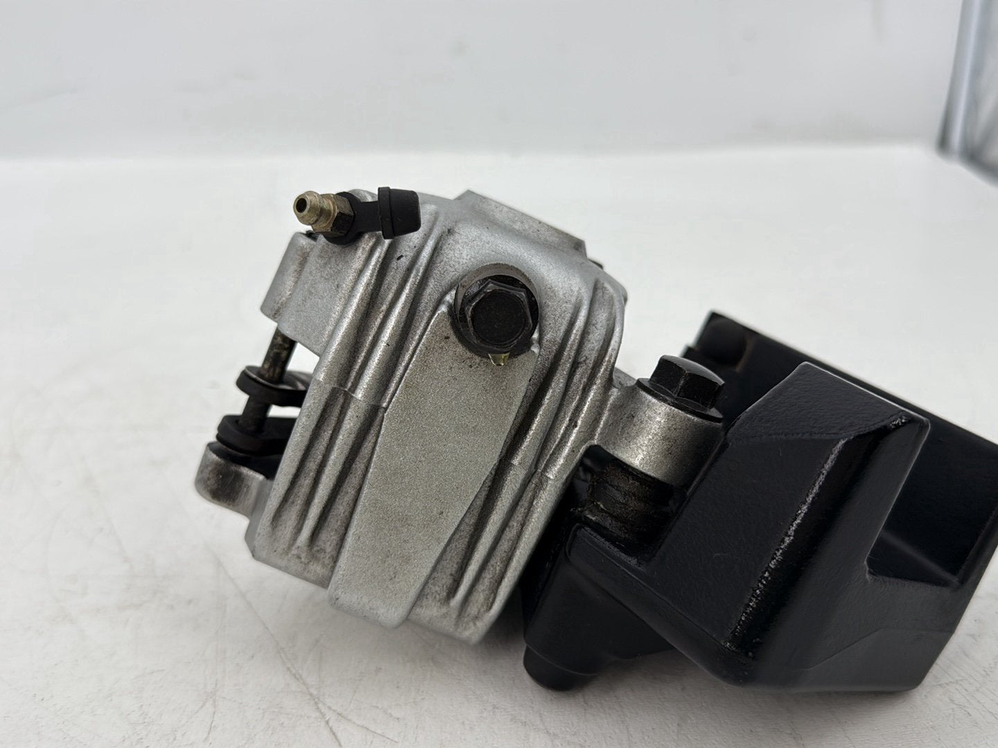 2006 Harley Sportster XL883C 883 Custom OEM Rear Back Brake Caliper w/ Bracket