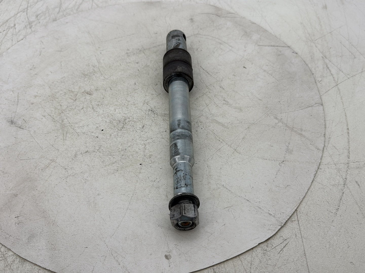 2015 Harley Dyna Low Rider FXDL OEM Front Wheel Axle Bolt Shaft