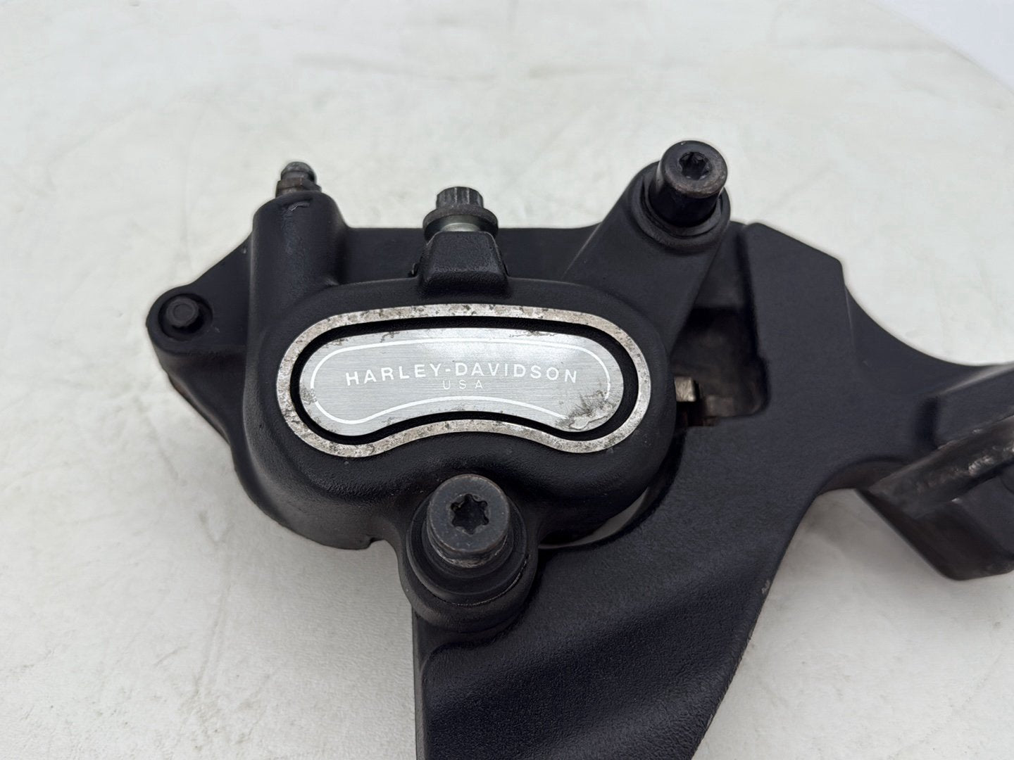 2012 Harley Dyna Fat Bob FXDF 103 OEM Rear Back Brake Caliper w/ Bracket