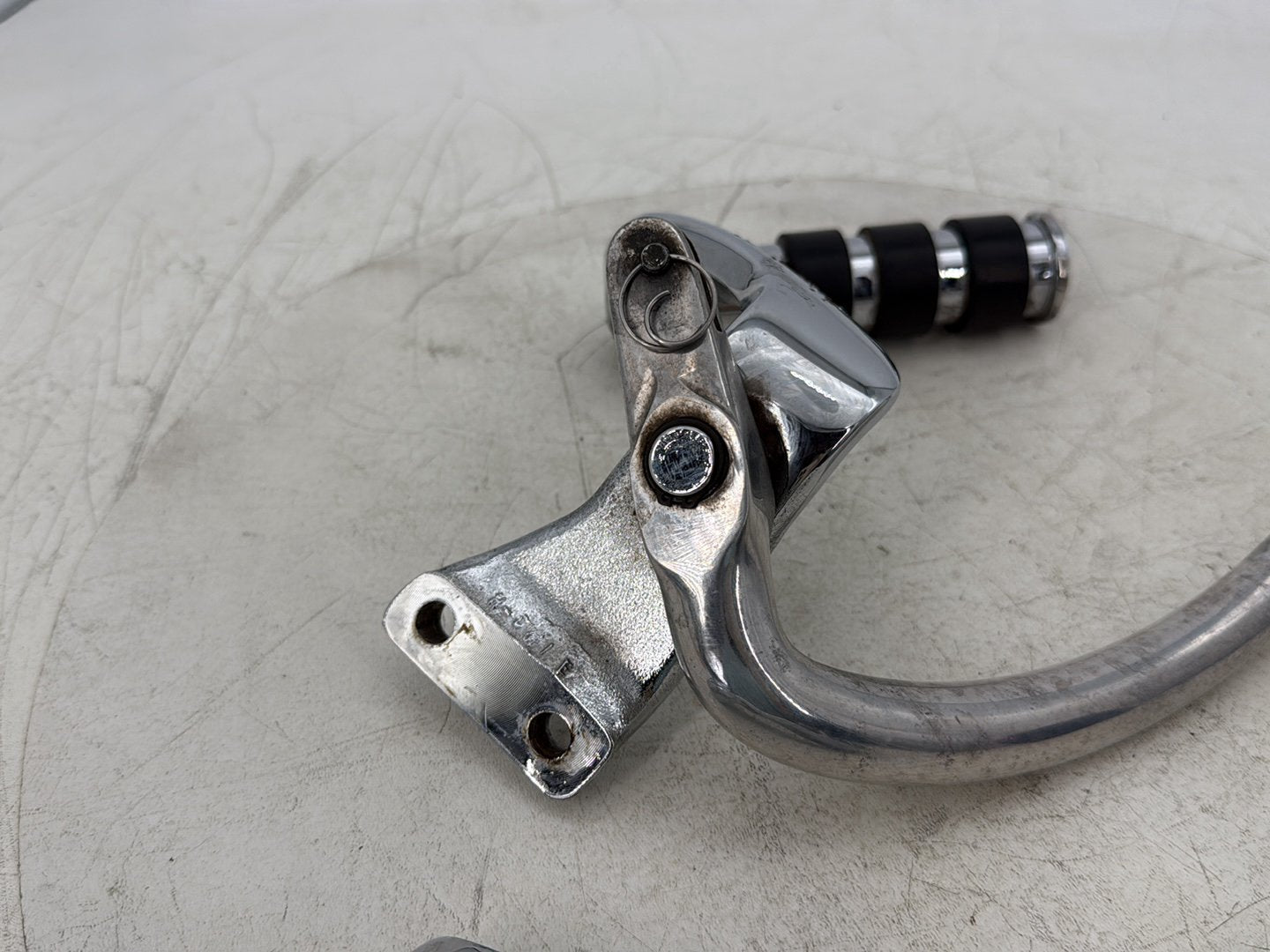 2015 Harley Dyna Low Rider FXDL OEM Right Driver Footpeg Bracket Mount