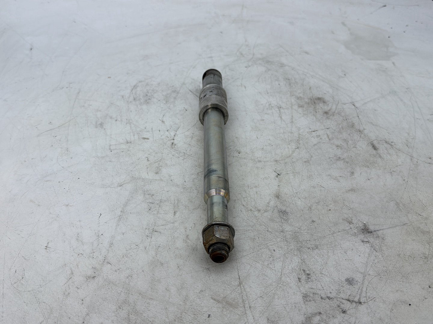 2012 Harley Dyna FXDF Fat Bob OEM Front Wheel Axle Bolt Shaft