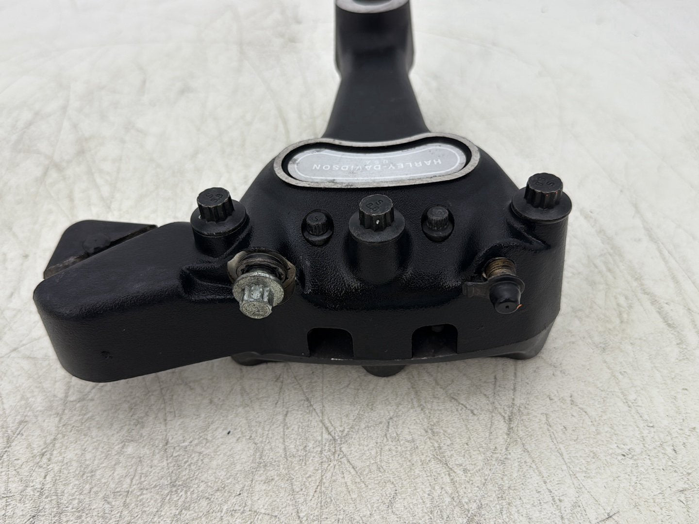 2004 Harley Dyna Super Glide FXDI OEM Rear Brake Caliper Bracket