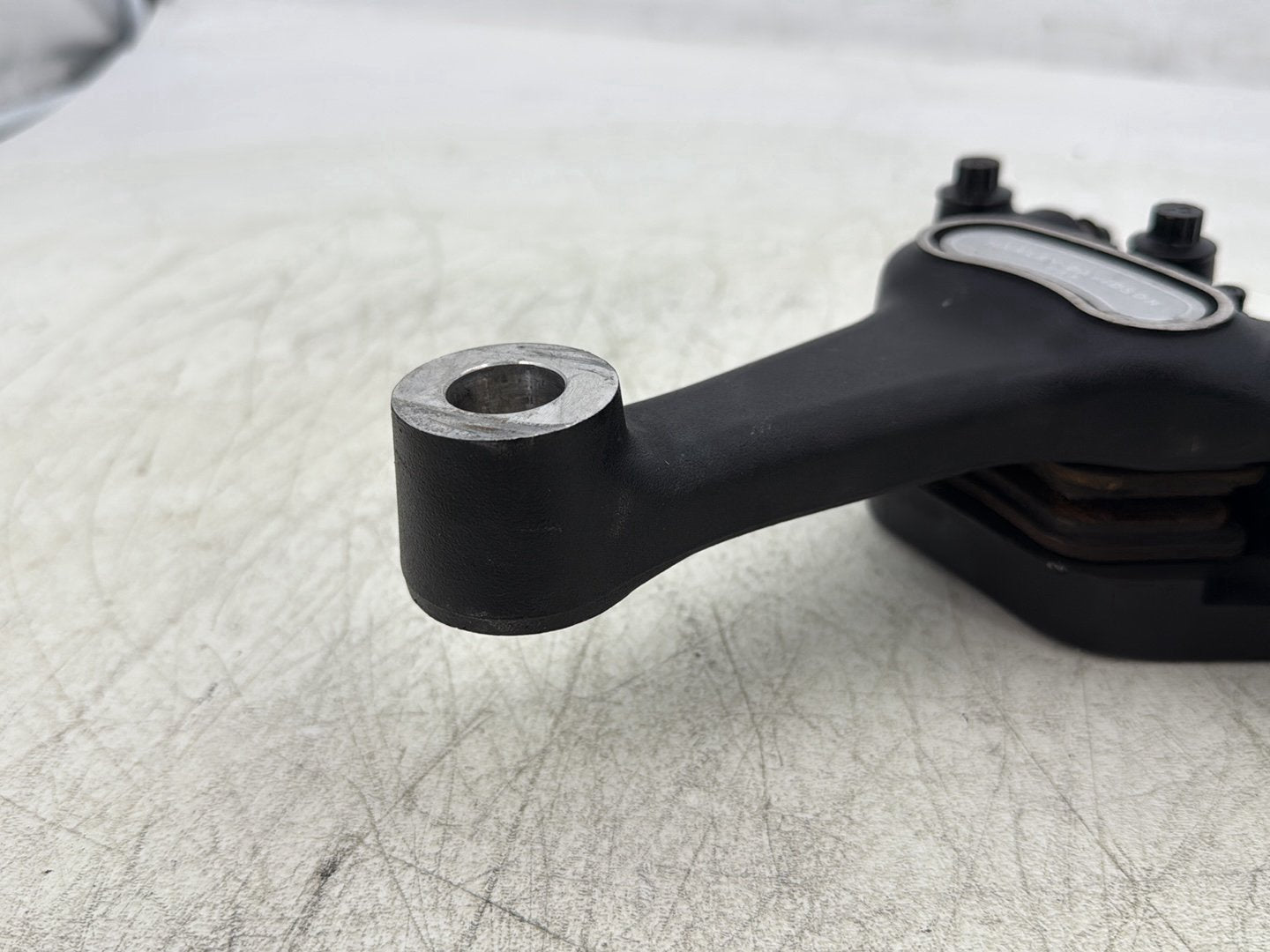 2004 Harley Dyna Super Glide FXDI OEM Rear Brake Caliper Bracket