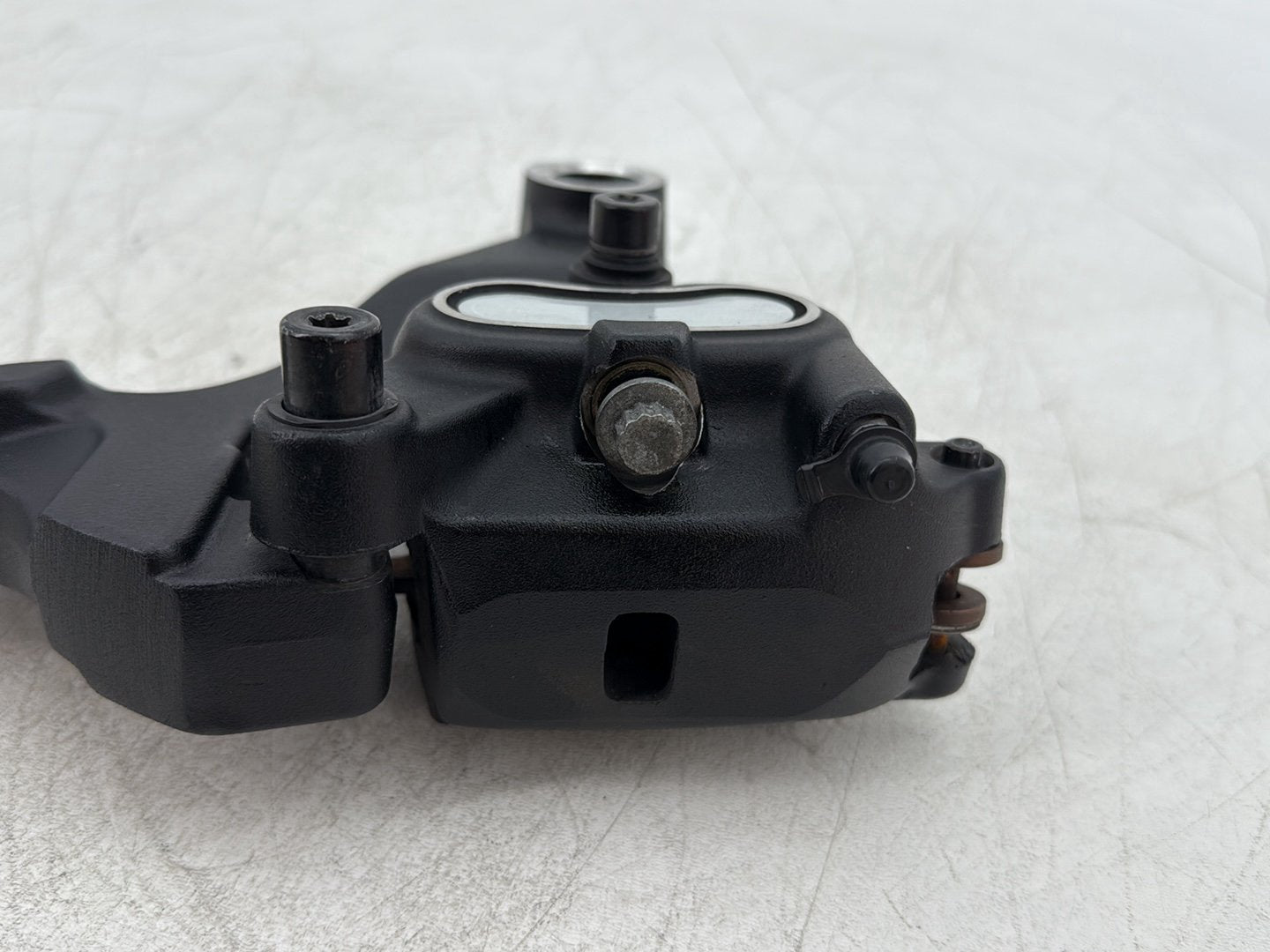 2010 Harley Dyna Fat Bob FXDF OEM Rear Back Brake Caliper w/ Bracket