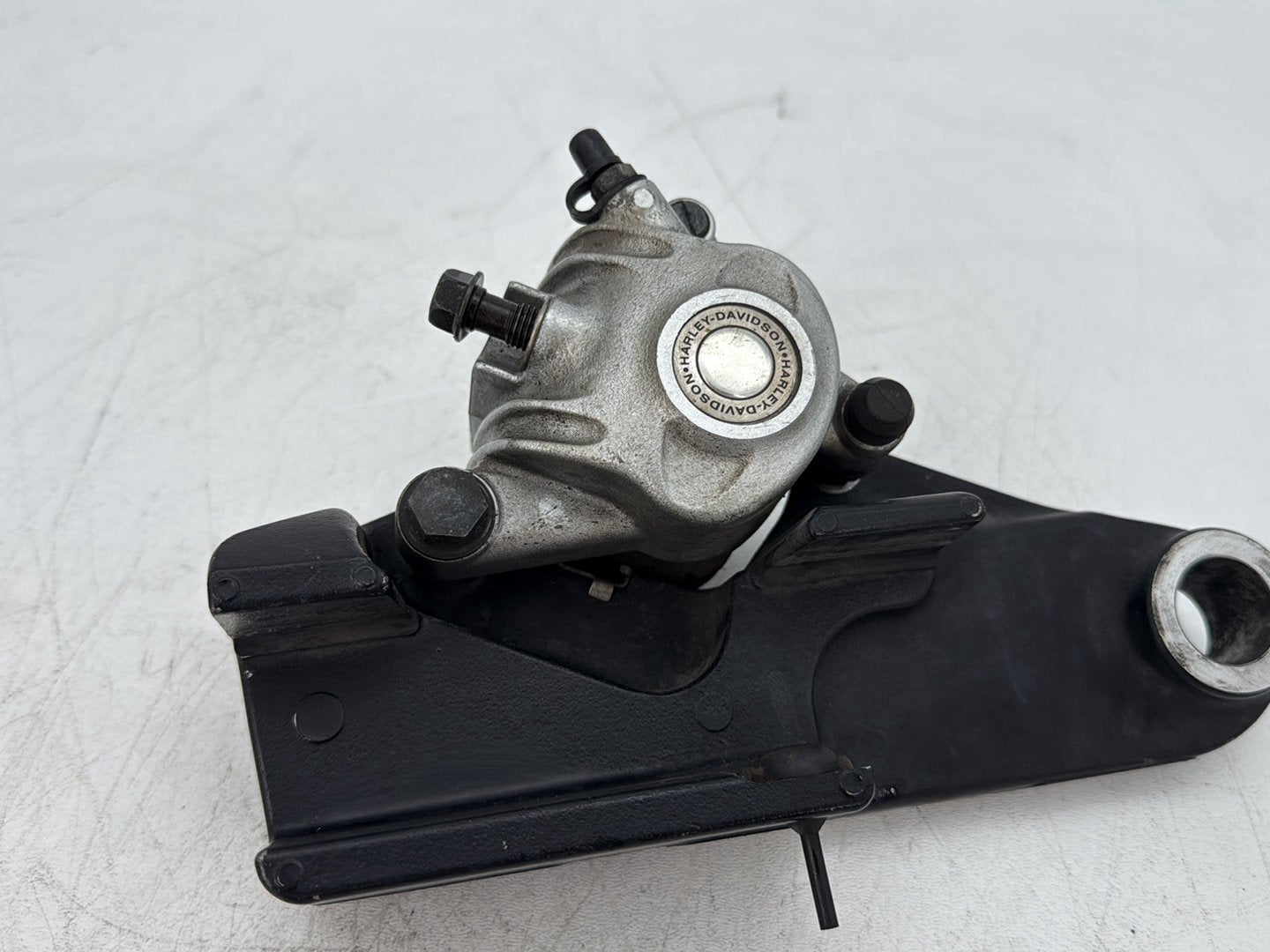 2009 Harley Sportster 883 Low XL883L OEM Rear Back Brake Caliper w/ Bracket