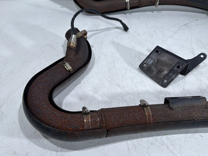 2008 Harley Dyna Fat Bob FXDF Exhaust Header Pipes Vance & Hines w/ Bracket