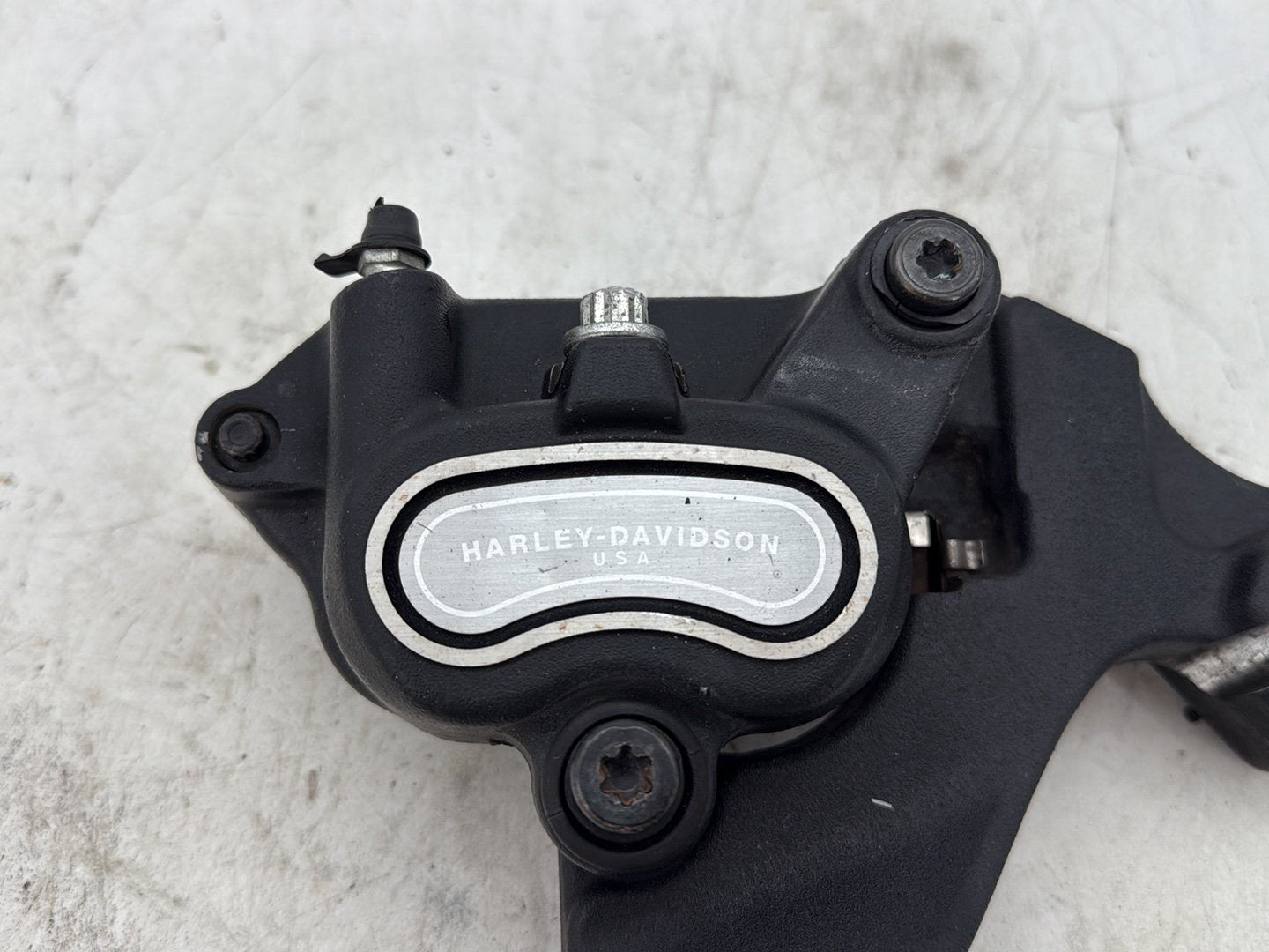 2012 Harley Dyna FXDF Fat Bob OEM Rear Back Brake Caliper w/ Bracket