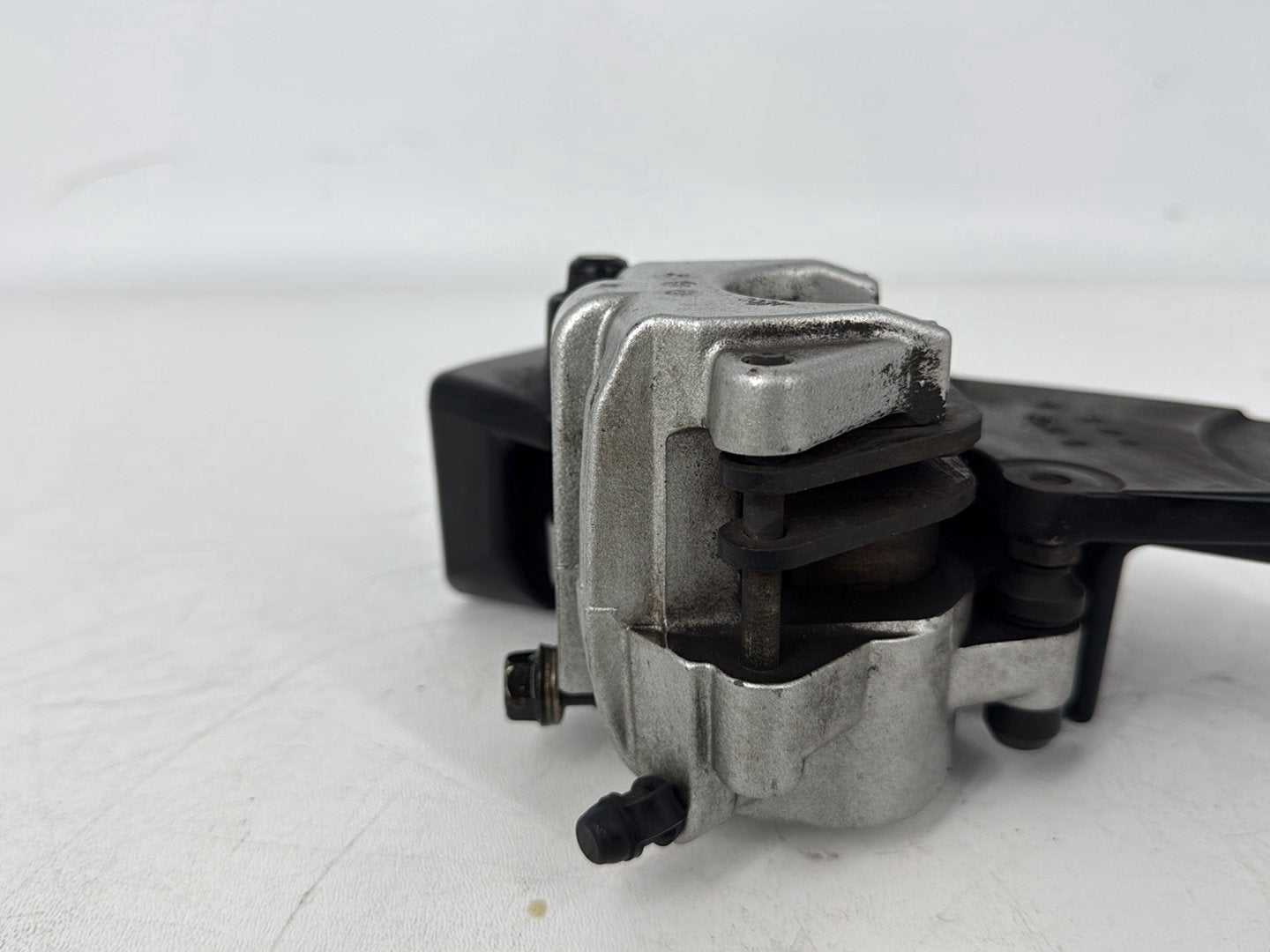 2005 Harley Sportster XL883C 883 Custom OEM Rear Back Brake Caliper w/ Bracket