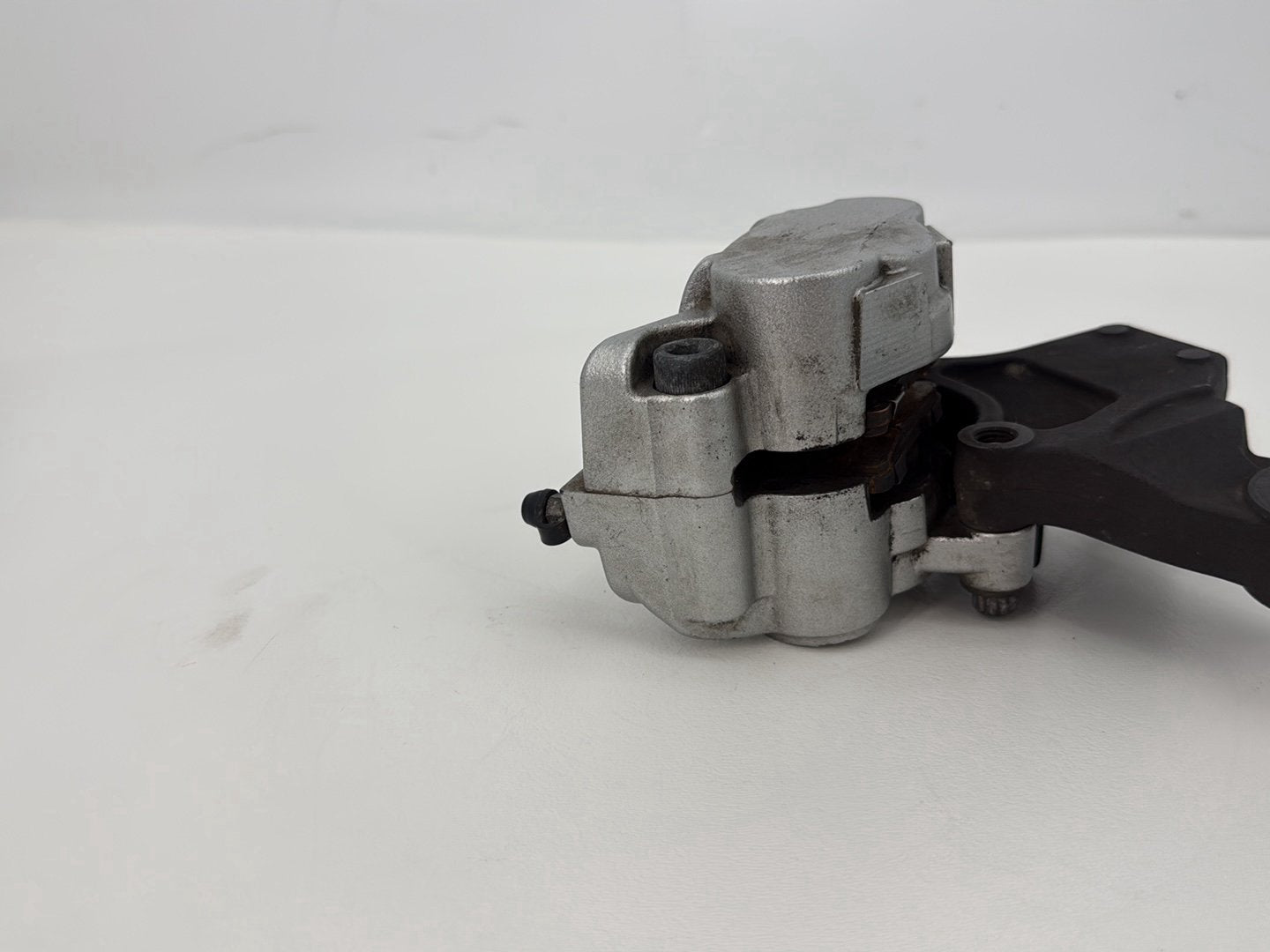 2014 Harley Sportster XL883L 883 SuperLow OEM Rear Back Brake Caliper w/ Bracket