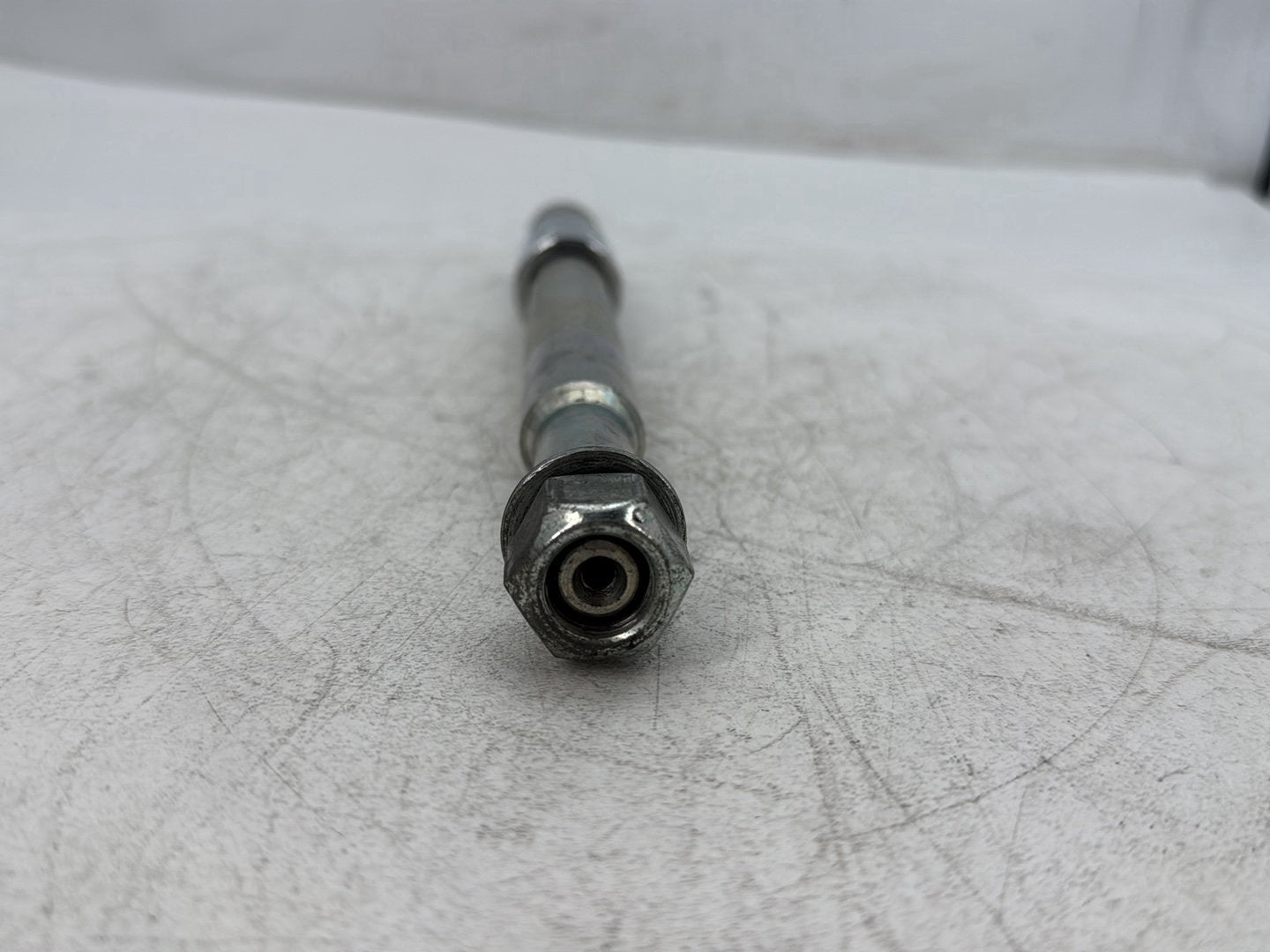 2010 Harley Street Glide Touring FLHX OEM Front Wheel Axle Bolt Shaft