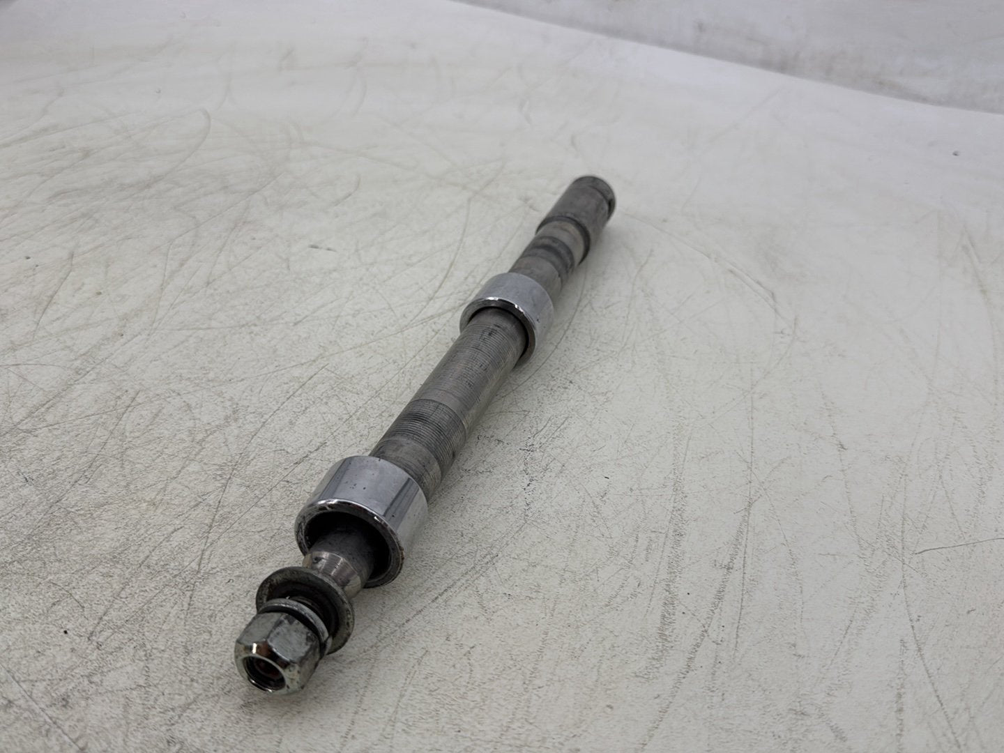 2007 Harley Touring FLHTC Electra Glide Classic OEM Front Wheel Axle Bolt Shaft