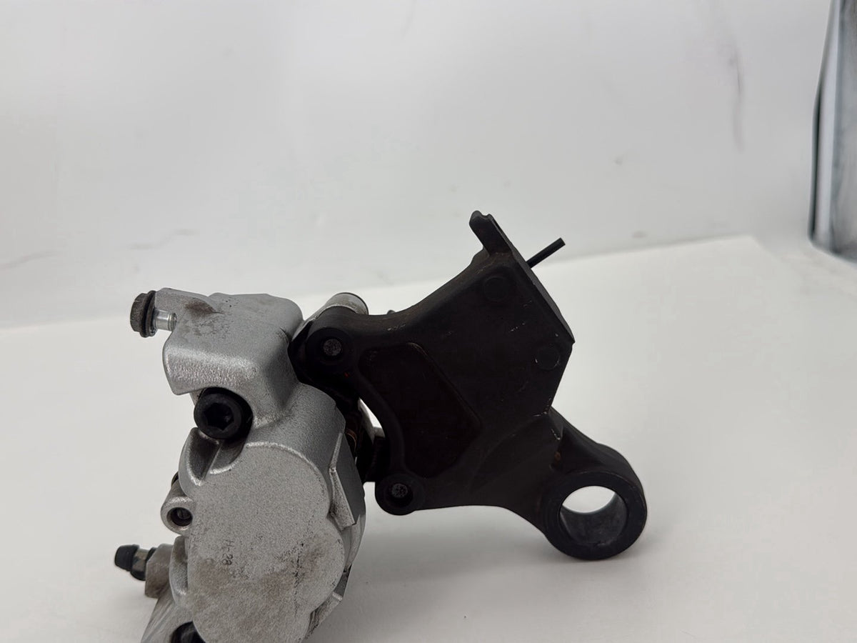 2014 Harley Sportster XL883L 883 SuperLow OEM Rear Back Brake Caliper w/ Bracket