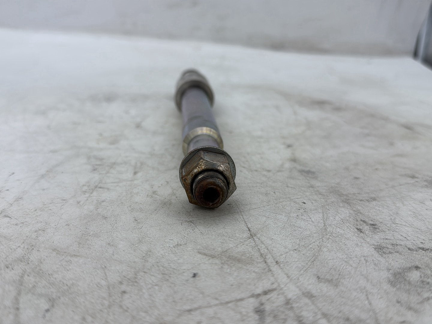2012 Harley Dyna FXDF Fat Bob OEM Front Wheel Axle Bolt Shaft