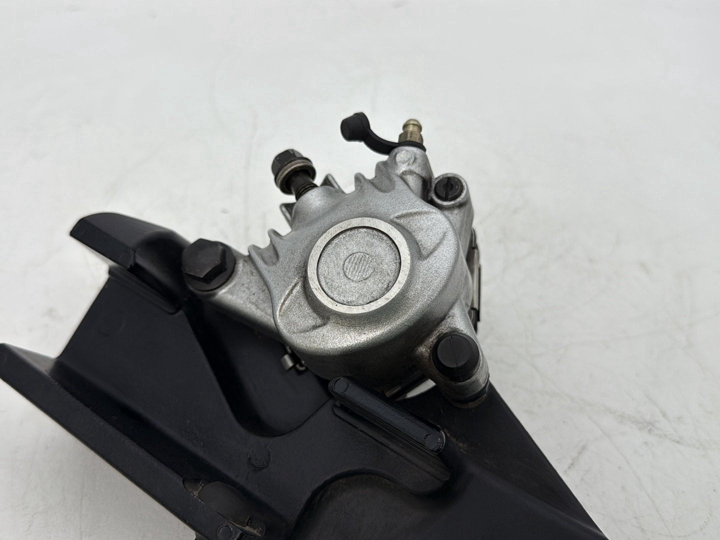 2006 Harley Sportster XL883C 883 Custom OEM Rear Back Brake Caliper w/ Bracket