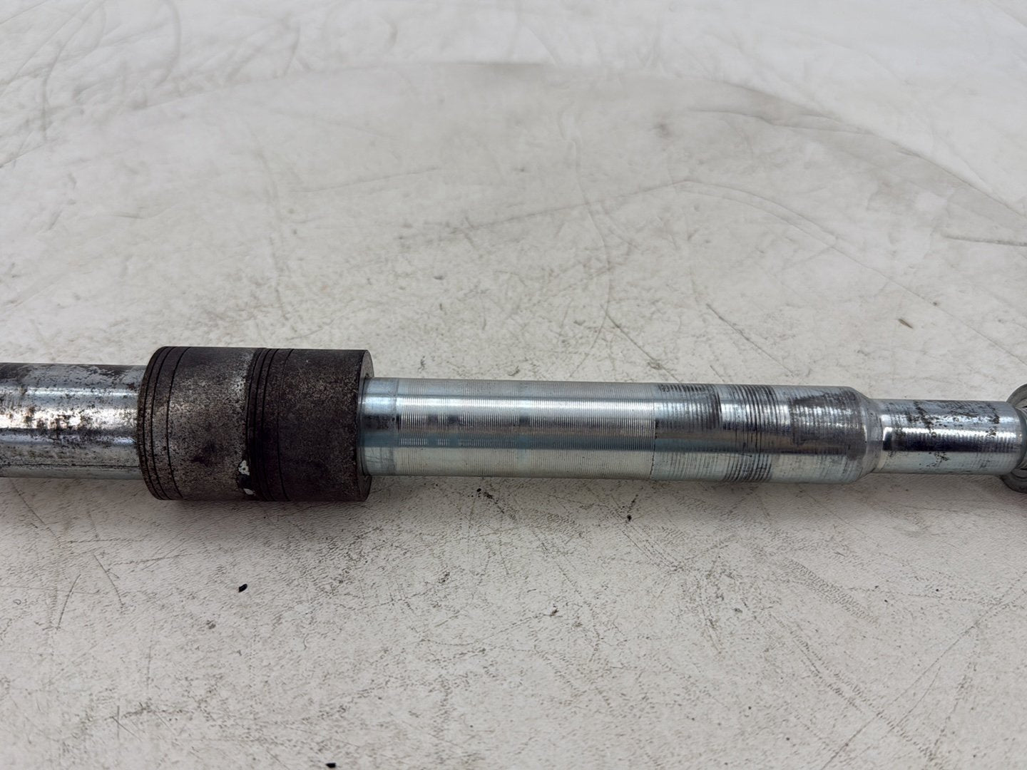 2015 Harley Dyna Low Rider FXDL OEM Front Wheel Axle Bolt Shaft