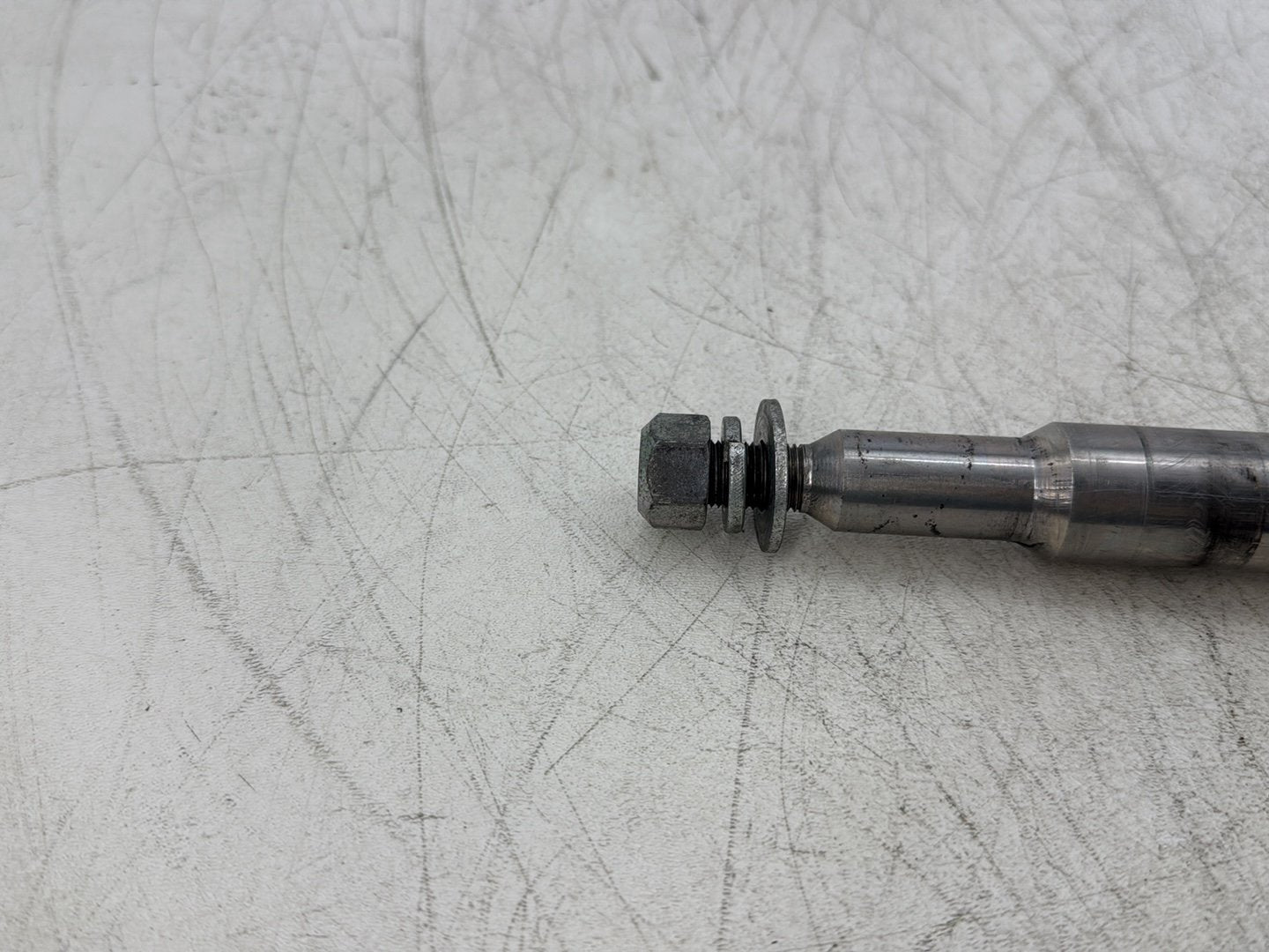 2007 Harley Dyna Street Bob FXDBI OEM Front Wheel Axle Bolt Shaft