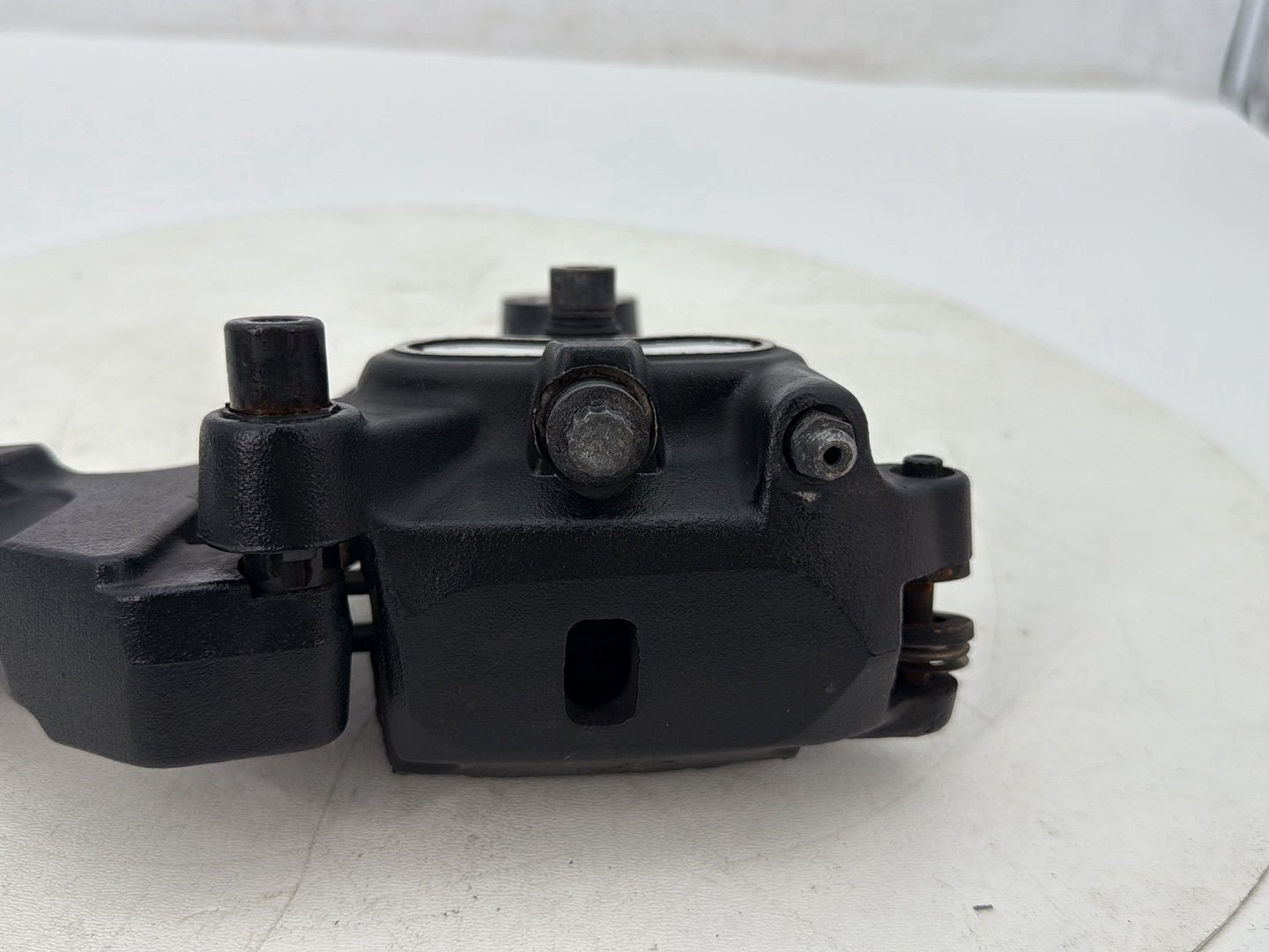2012 Harley Dyna Fat Bob FXDF 103 OEM Rear Back Brake Caliper w/ Bracket