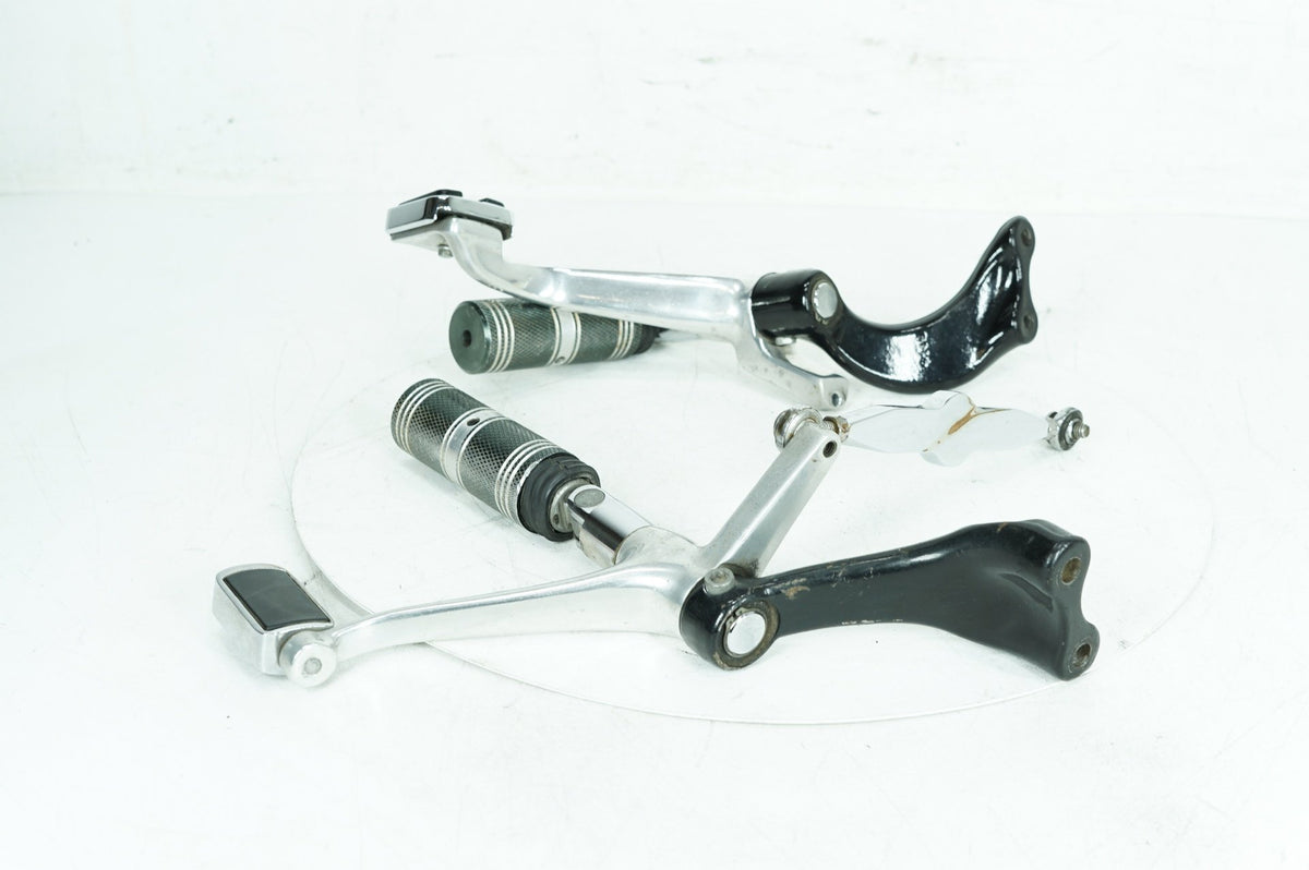 05 Harley Sportster XL1200 C Custom OEM Left & Right Driver Step Foot Rest Pegs