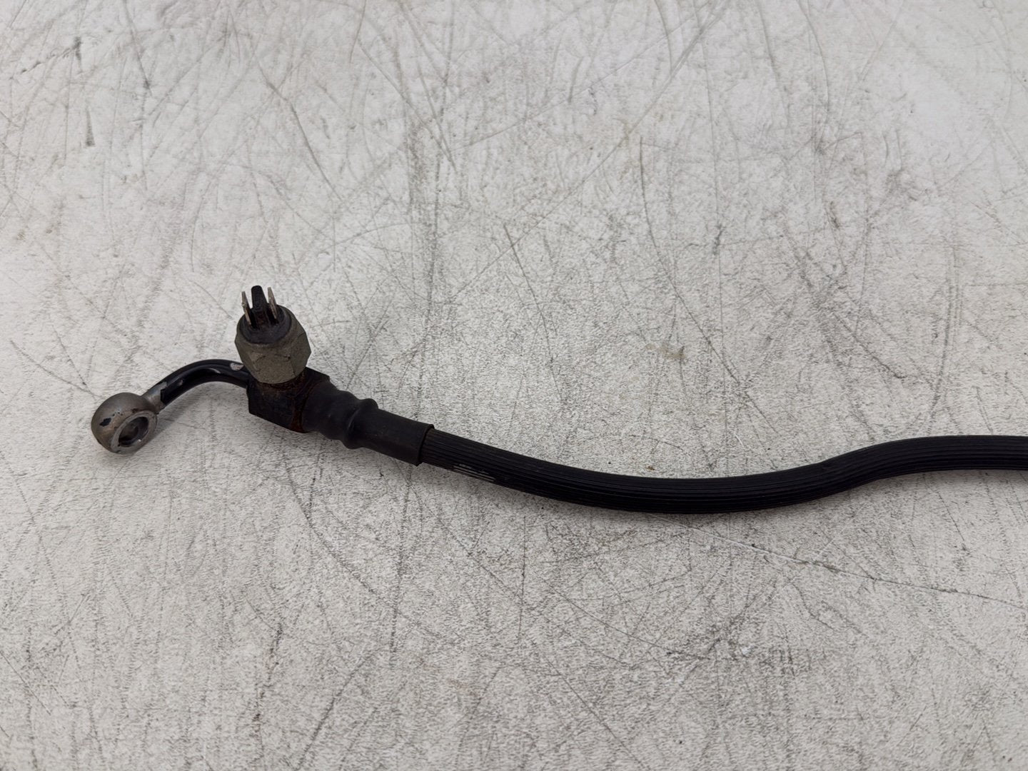 2007 Harley Dyna Street Bob FXDBI OEM Rear Brake Hose Line Pipe
