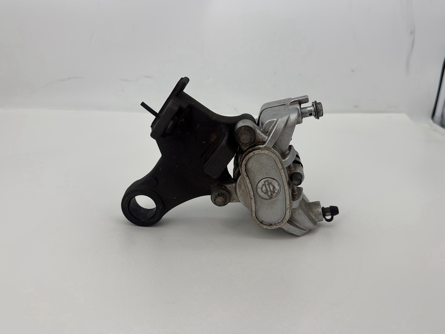 2014 Harley Sportster XL883L 883 SuperLow OEM Rear Back Brake Caliper w/ Bracket