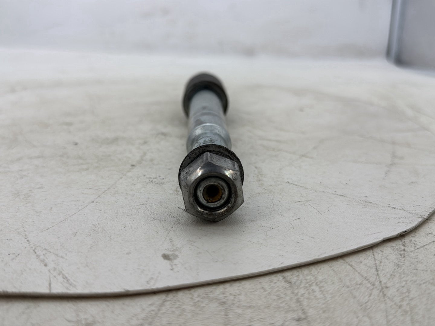 2015 Harley Dyna Low Rider FXDL OEM Front Wheel Axle Bolt Shaft