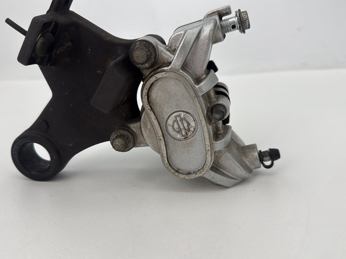 2014 Harley Sportster XL883L 883 SuperLow OEM Rear Back Brake Caliper w/ Bracket