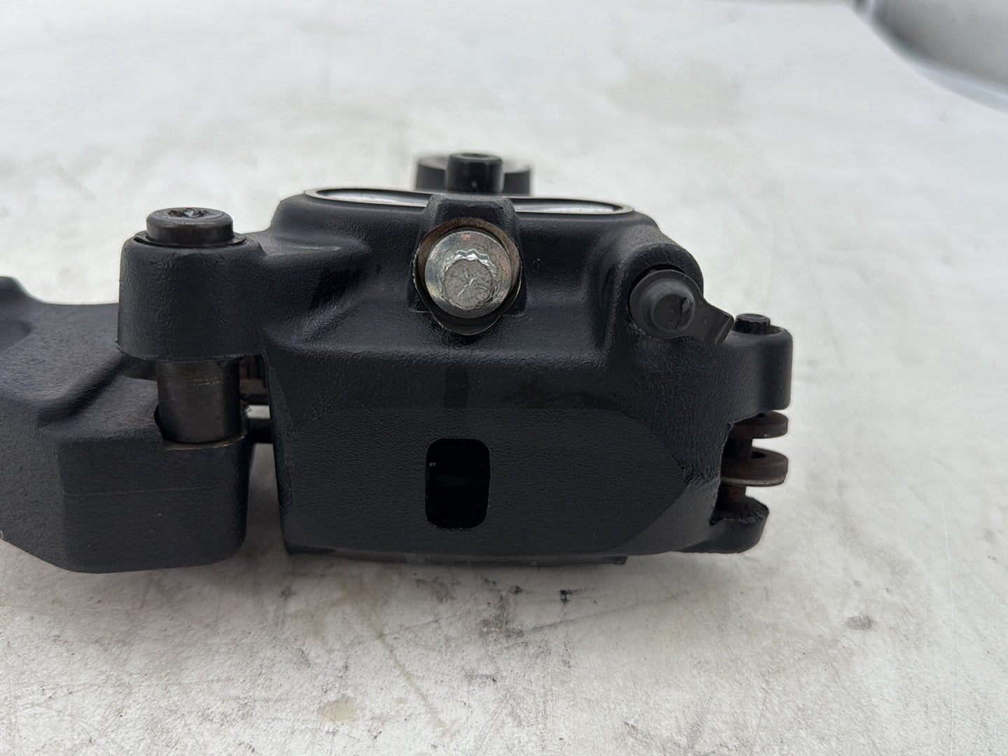 2012 Harley Dyna FXDF Fat Bob OEM Rear Back Brake Caliper w/ Bracket