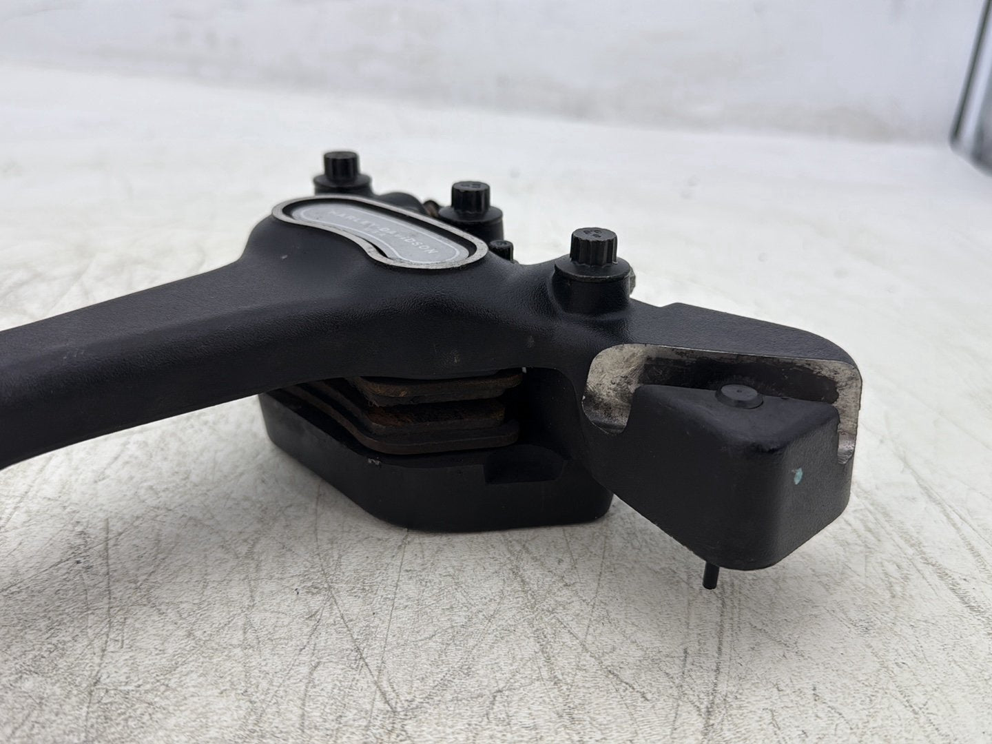 2004 Harley Dyna Super Glide FXDI OEM Rear Brake Caliper Bracket
