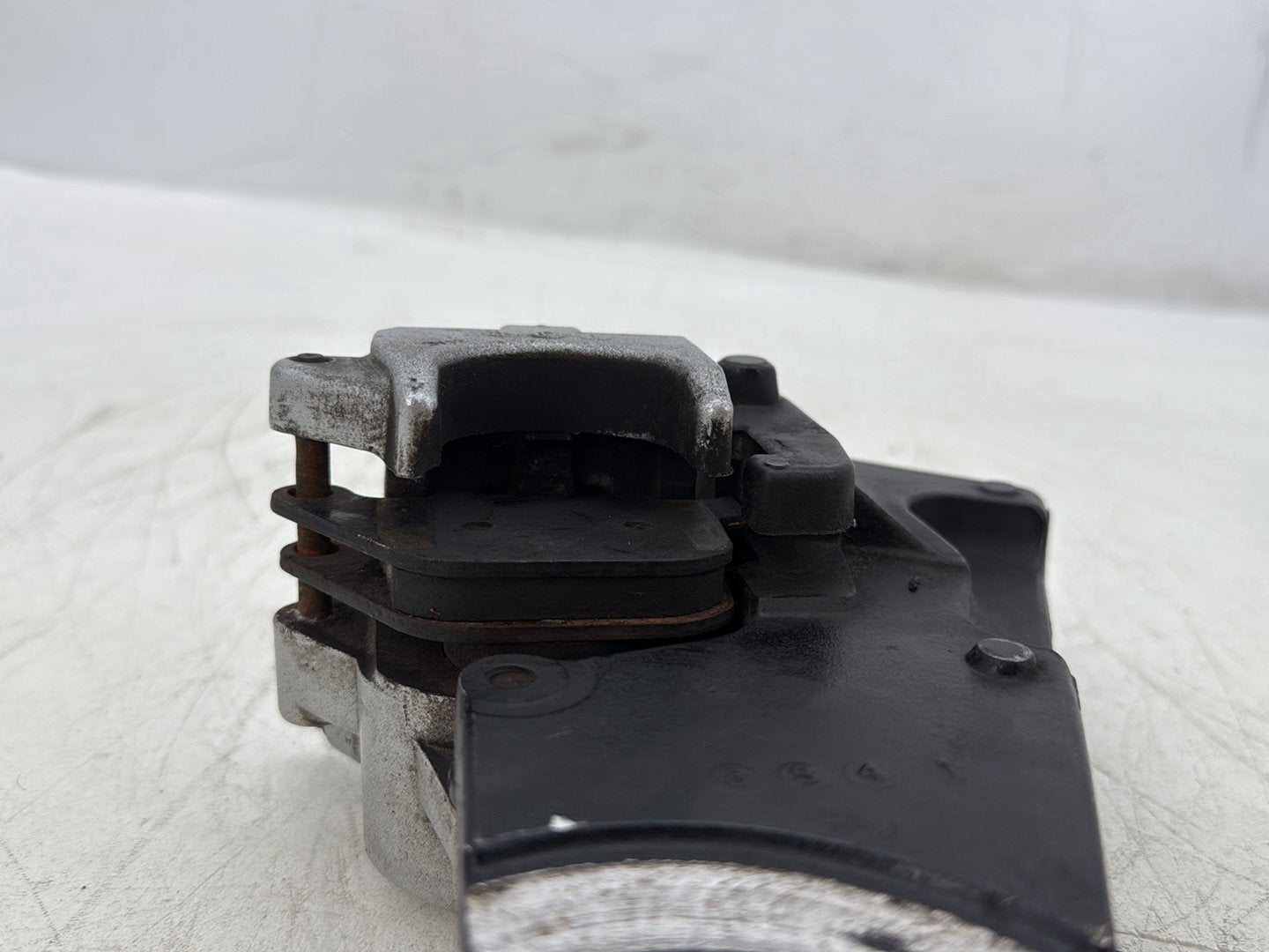 2004 Harley Sportster XL883C 883 Custom OEM Rear Back Brake Caliper w/ Bracket