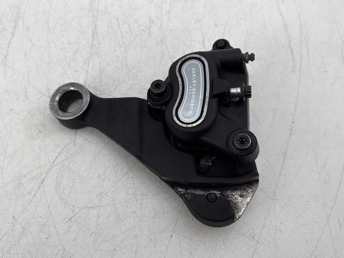 2011 Harley Softail FLSTFB Fat Boy OEM Rear Back Brake Caliper w/ Bracket