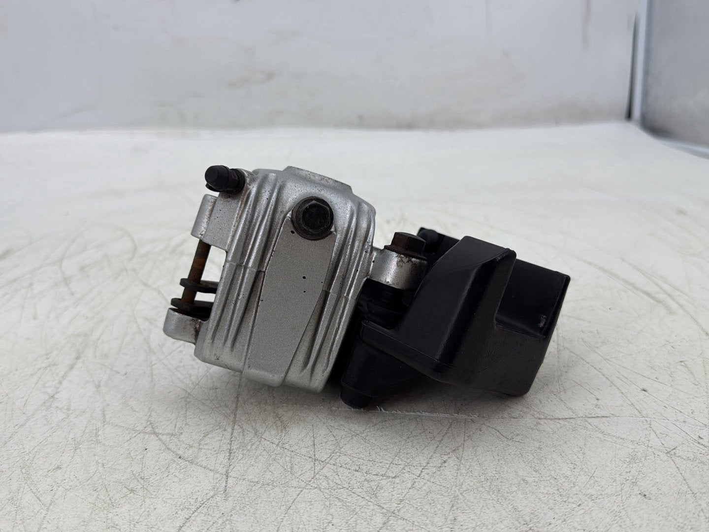 2004 Harley Sportster XL883C 883 Custom OEM Rear Back Brake Caliper w/ Bracket