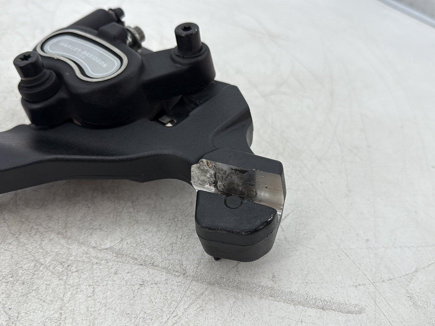 2010 Harley Dyna Fat Bob FXDF OEM Rear Back Brake Caliper w/ Bracket
