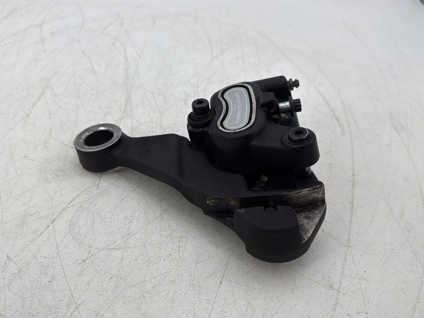 2011 Harley Softail FLSTFB Fat Boy OEM Rear Back Brake Caliper w/ Bracket